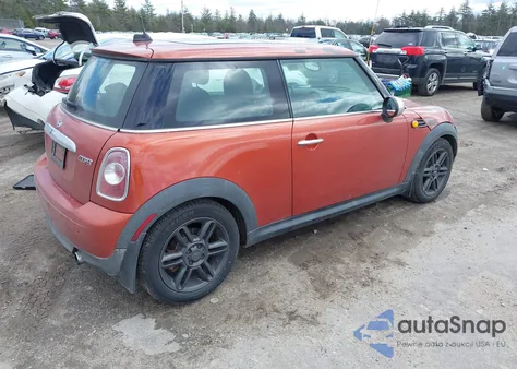 2011 Mini Cooper z USA, uszkodzony, nr VIN WMWSU3C54BTX96143